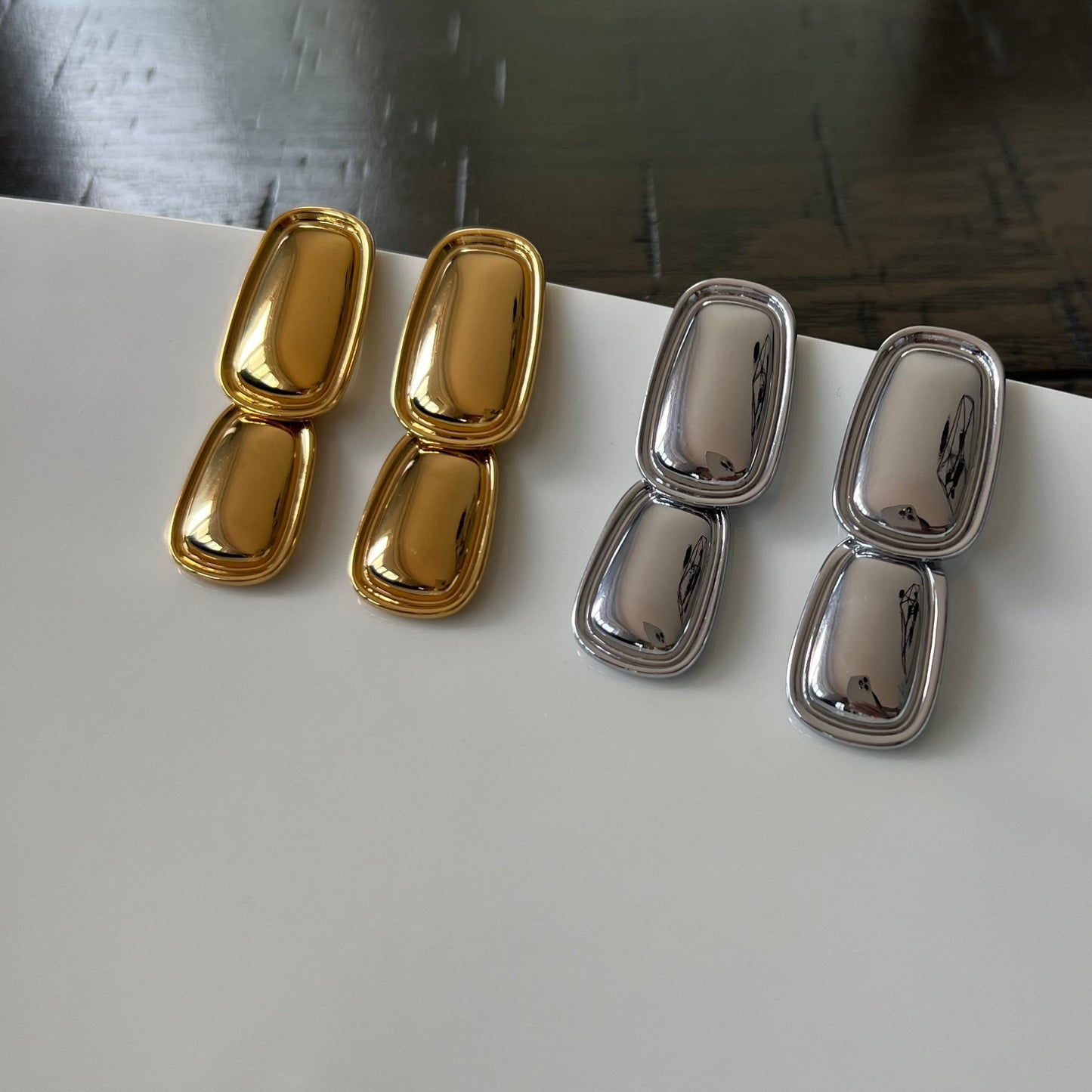 Double Rectangle, mirror polished drop earrings in gold and silver