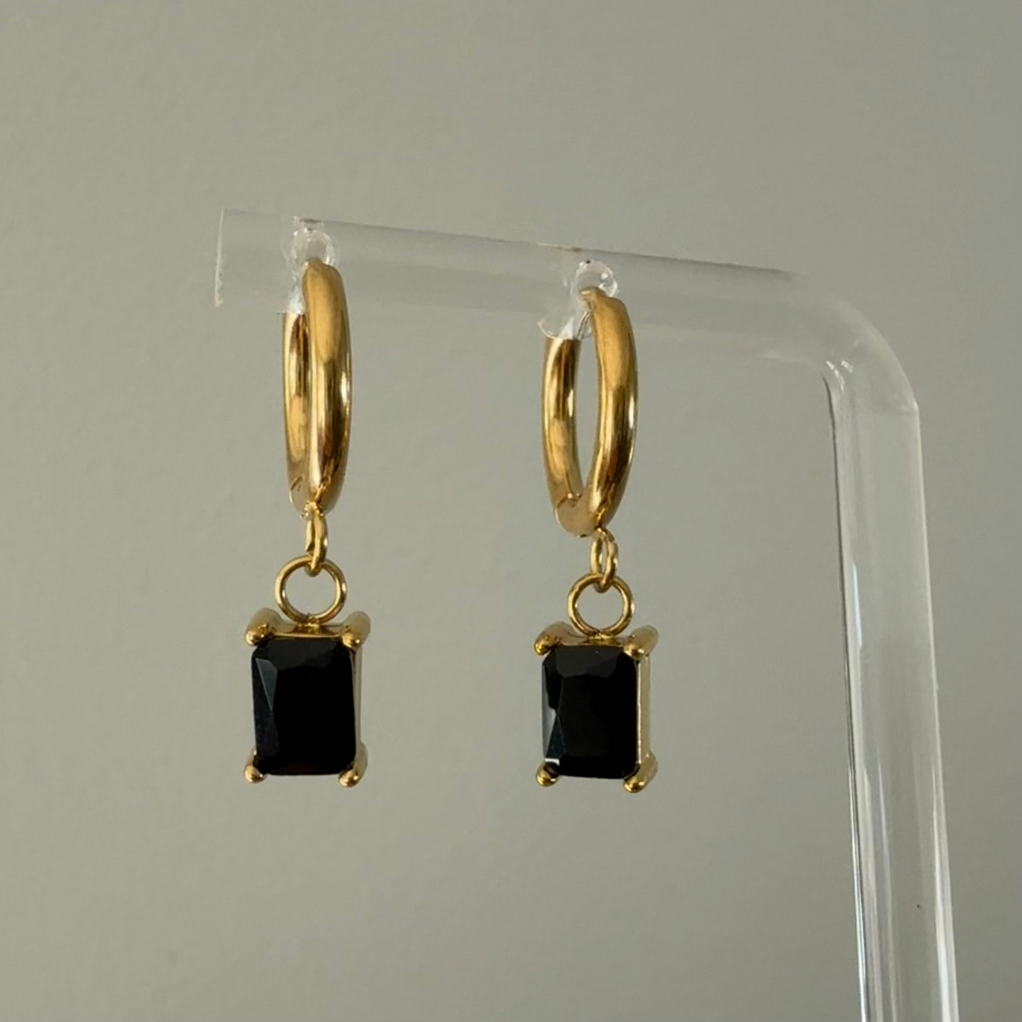 Black Baguette Drop Earrings in gold
