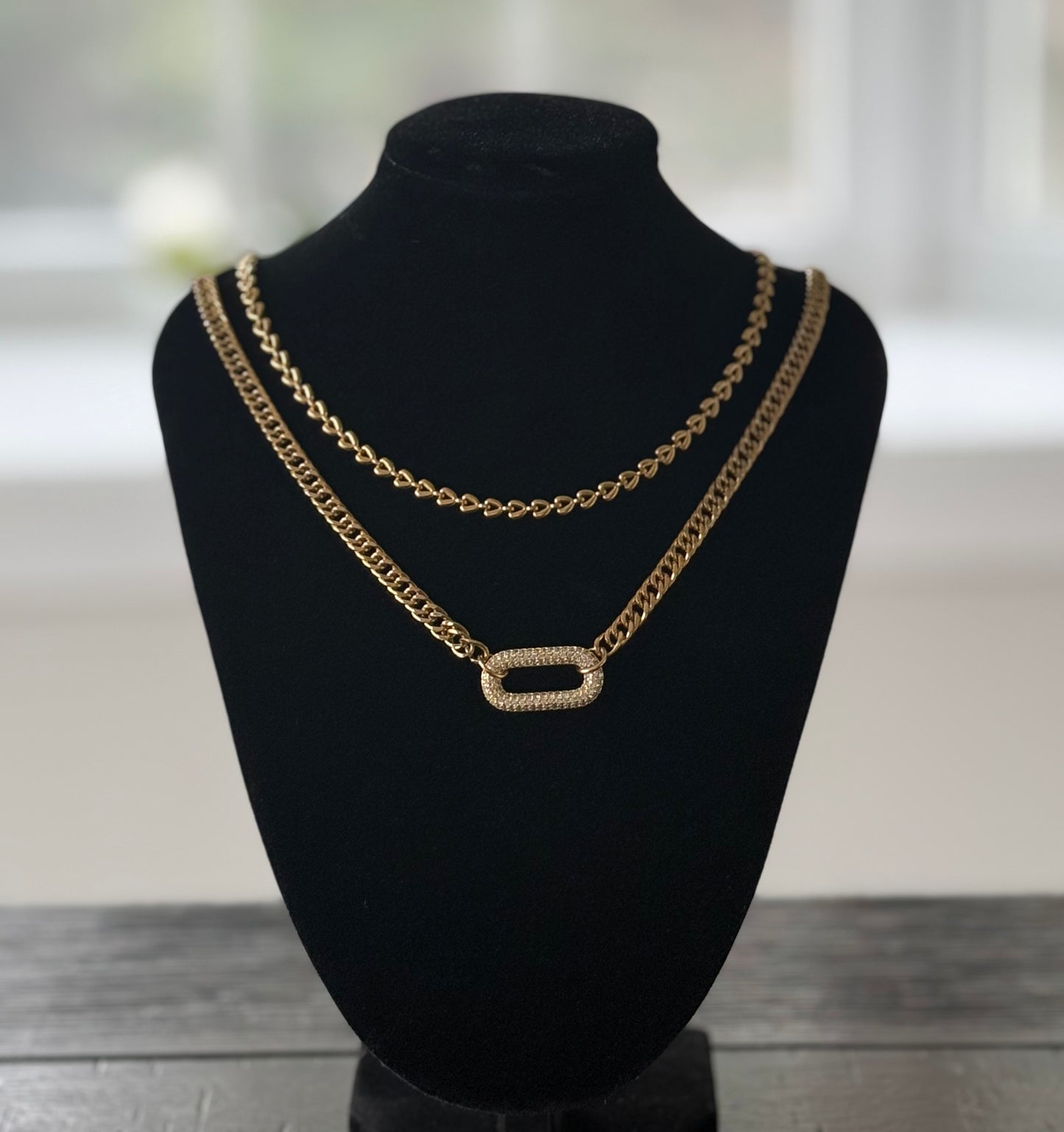 Curb chain with zircon link necklace paired with gold heart link necklace