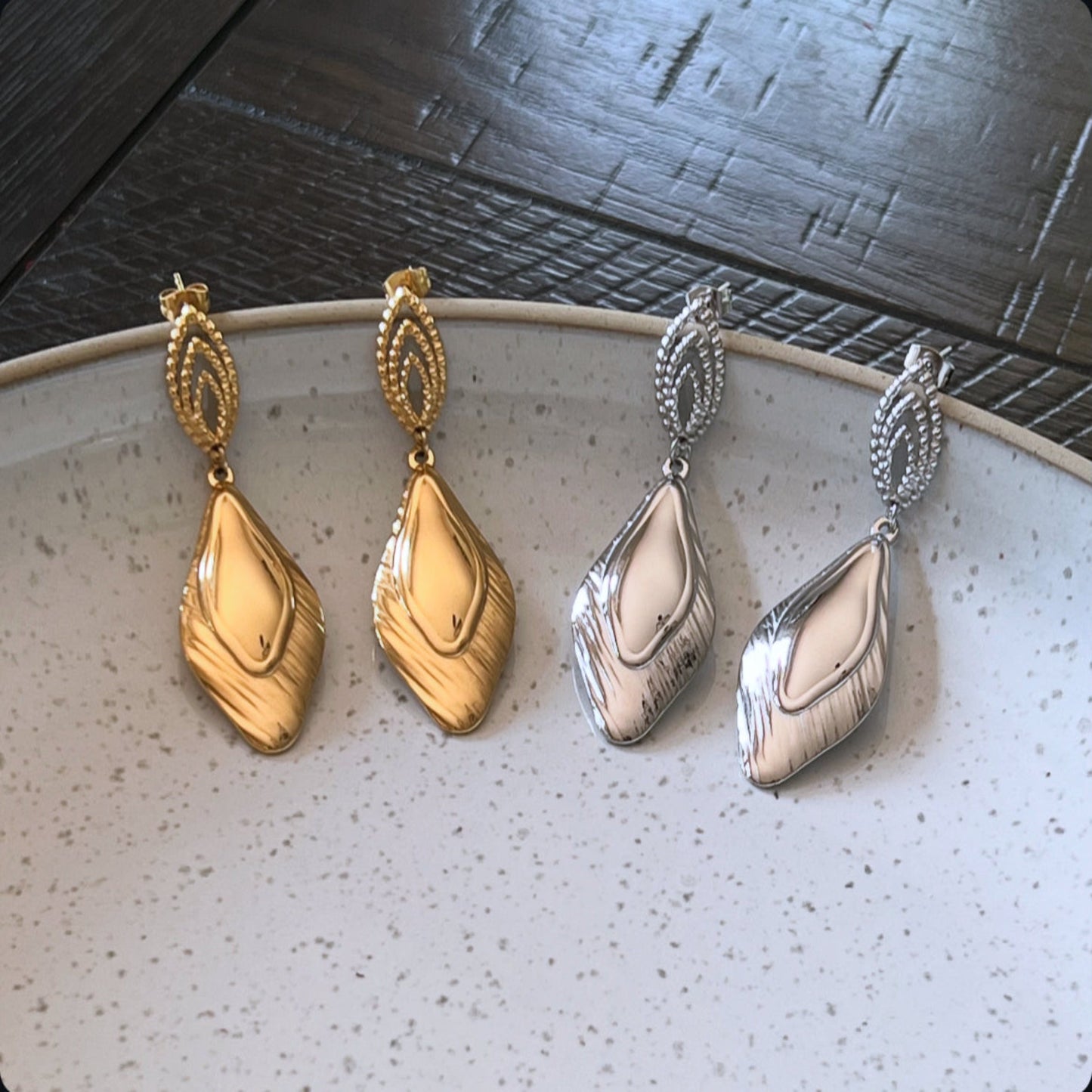 Textured tear drop earrings in gold and silver