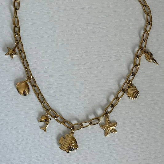 Ocean themed charm necklace in gold