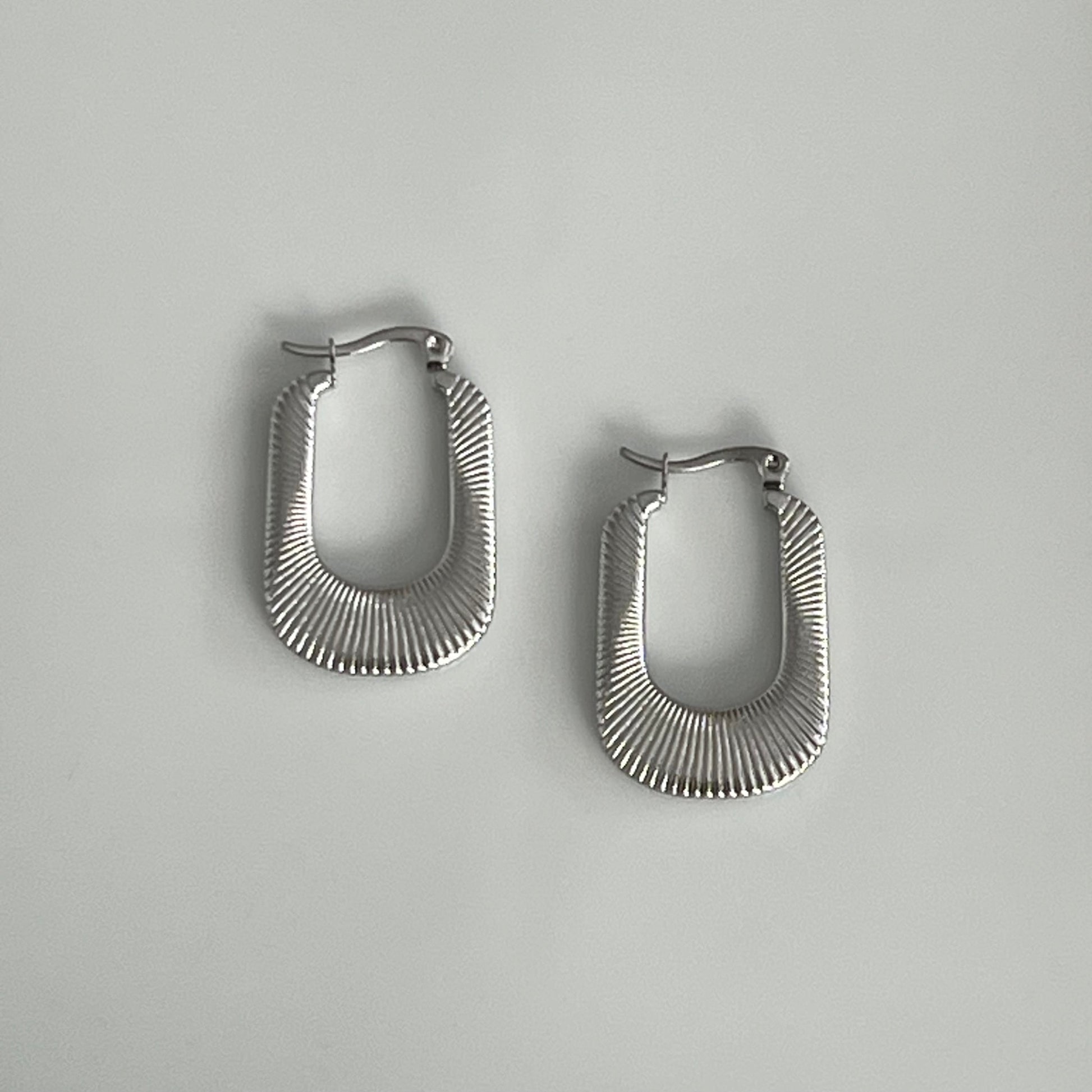 Silver U shaped hoops